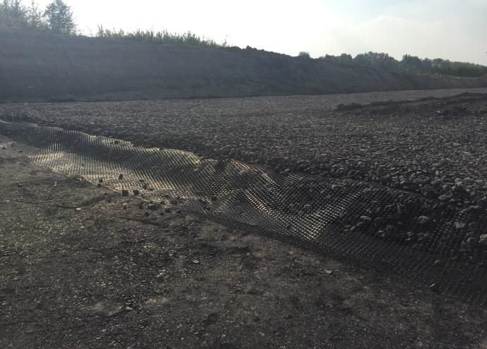 Photo of landfill buttress base layer stabilization