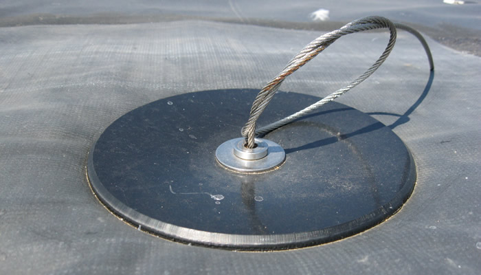 Temporary landfill cap anchor photo by Chris Kelsey